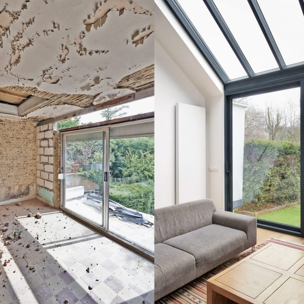 Modern,Living,Room,With,Large,Windows,And,View,On,Seaside.